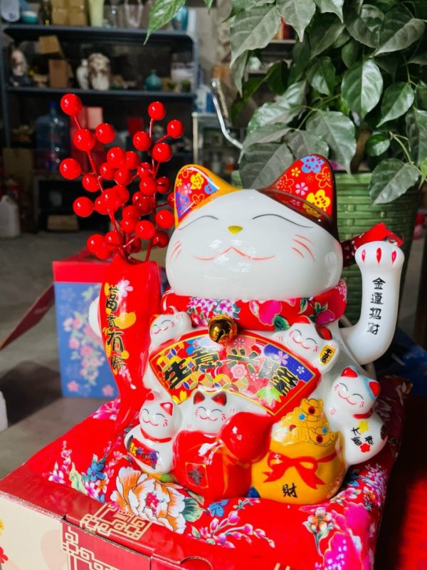 Mèo vẫy tay Làm ăn Phát Tài - cao 20cm (cầm bông lúa/ đào đông) - Cầm đào đông