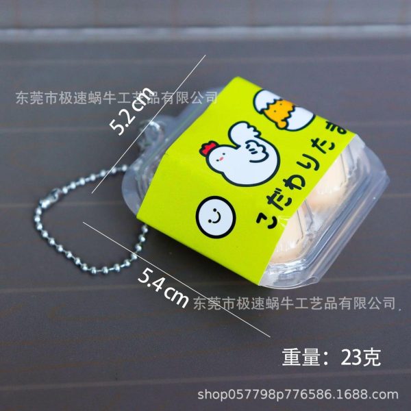Móc khóa mô hình đồ ăn vặt, đồ dùng phồng 3D - Khay trứng K255 - Vàng