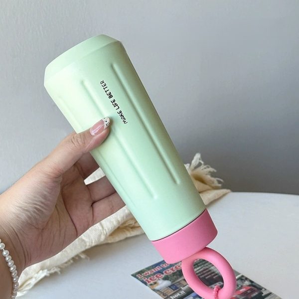 Bình giữ nhiệt tay tròn BL100 pastel kèm charm hoa cúc