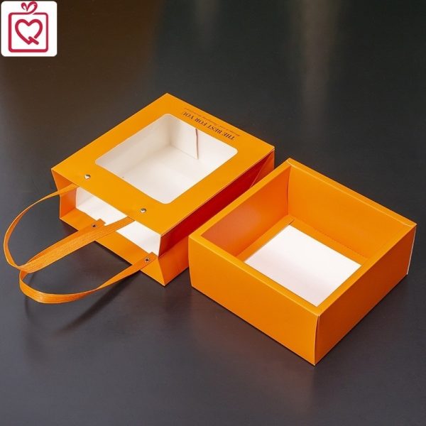 Hộp đựng quà tặng H27 ô cửa nhựa mica có quai xách, hộp quà mặt kính kèm rơm giấy 18x18cm